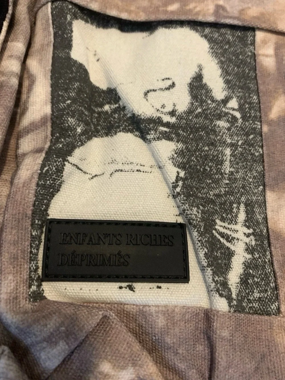 'The Mystery of Tap Water' Beige Camouflage Backpack